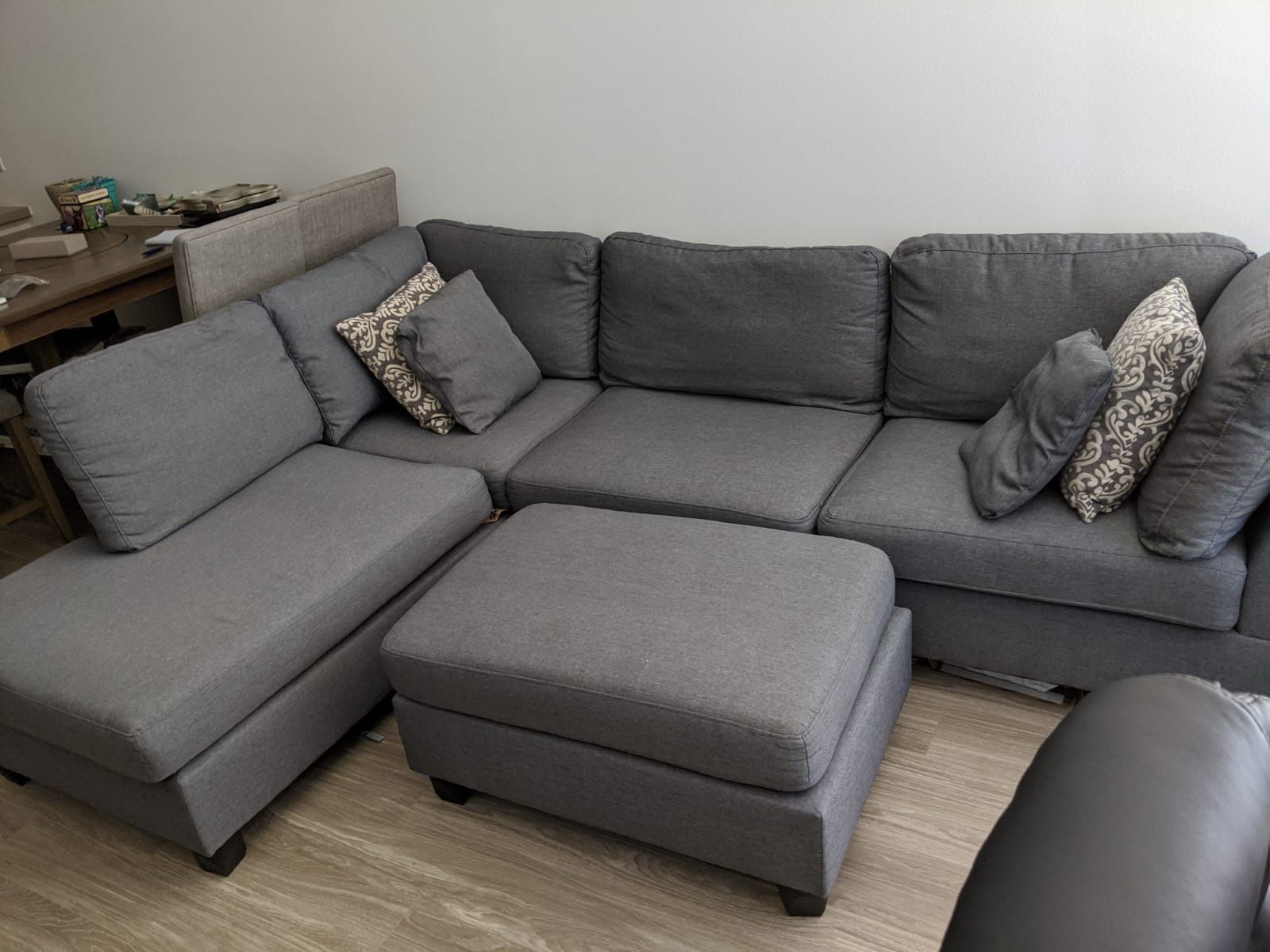 Available if up: Gray L shaped couch, Reversible. Price Firm