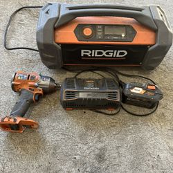 RIDGID Battery, battery charger, radio, impacted 