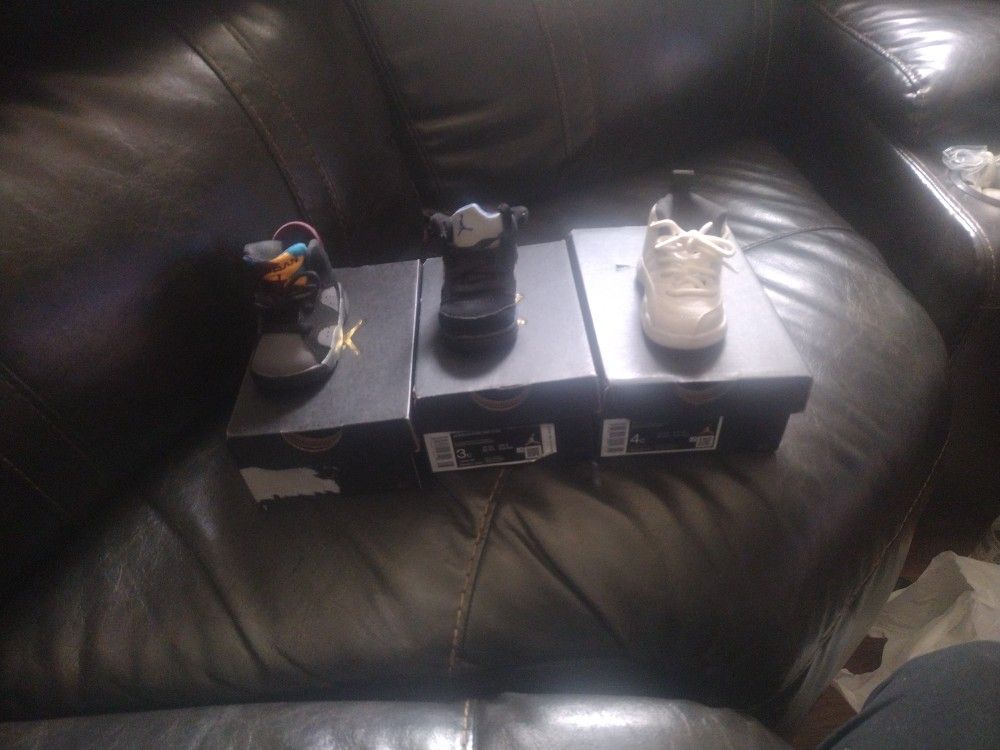 Kids Jordans Two Pai Of Size 3c 1 Pair Of 4c. 25 Each