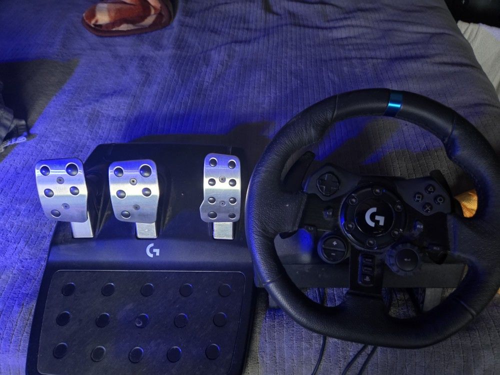 Logitech G29 driving force racing wheel and floor pedal.