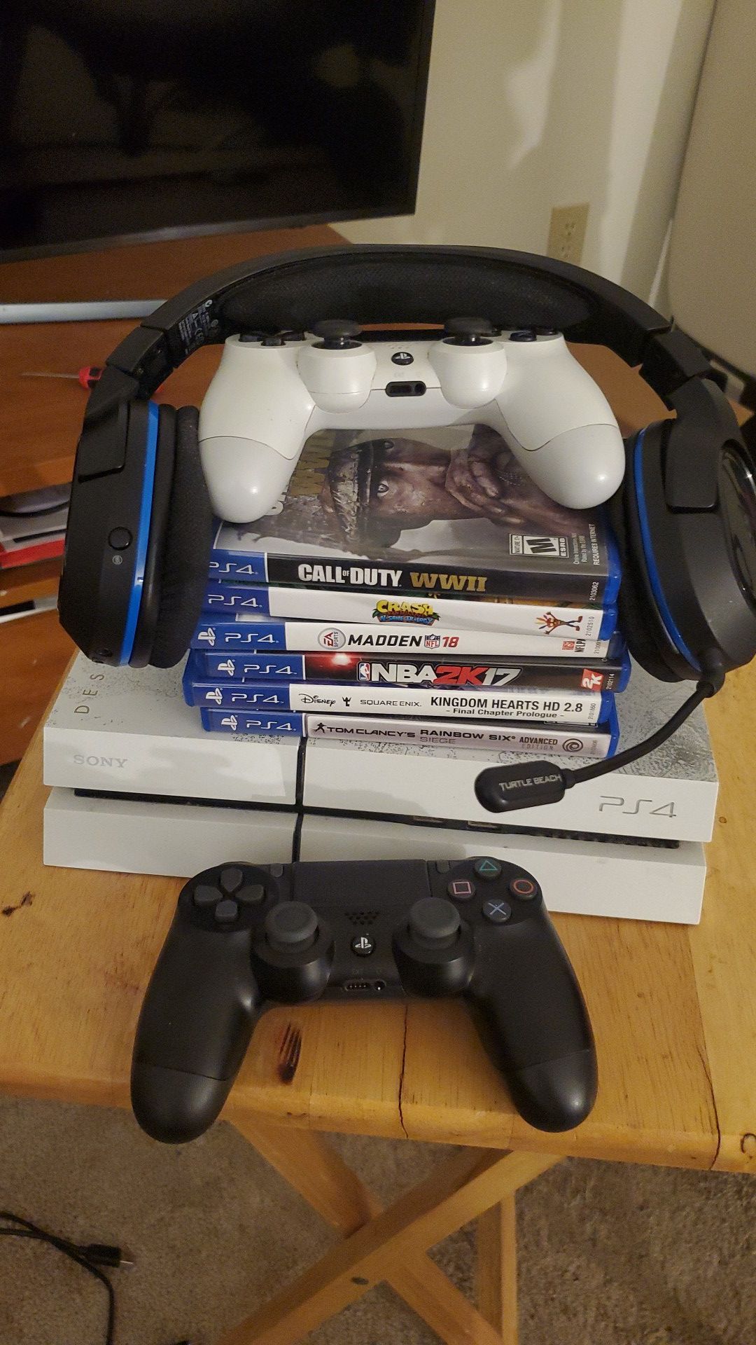PS4 500GB Destiny edition with Turtle Beach headset, a few games and 2 controllers for 300.