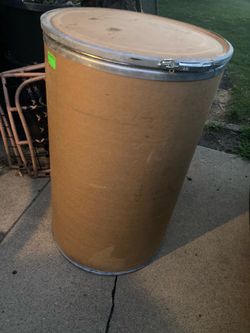 Large cardboard storage barrel