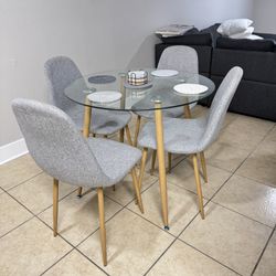 Modern Glass Dining Table With 4 Grey Chairs 