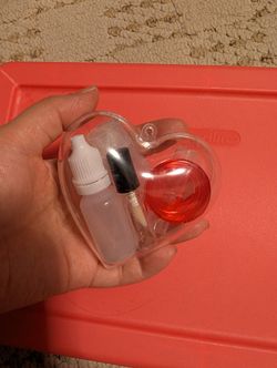 Mini empty refillable set in a heart ornament bauble