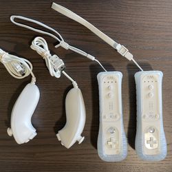 $50 For Two OEM Nintendo Wii / Wii U Remotes With Nunchucks And Silicon Cases