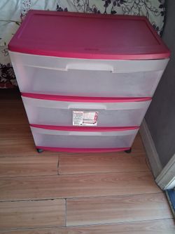 Pink clear storage container with wheels