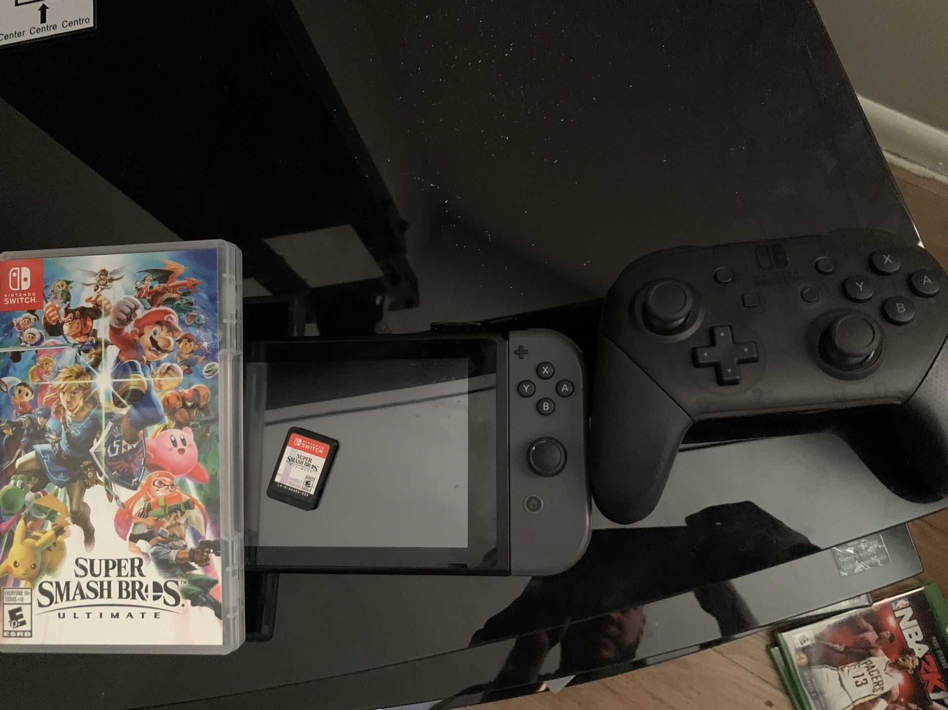 Nintendo Switch with Joy Cons + Dock + Pro Controller + Super Smash