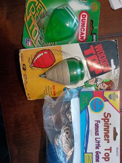 3 older toy tops