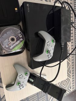 Xbox One with controllers and games