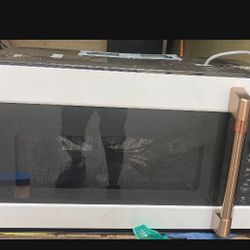  Café 1.7 Cu. Ft. Convection Over-the-Range Microwave Oven, model CVM517P4RW2. 