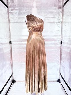 DulcesDreams Gold Metallic One-Shoulder Pleated Maxi Dress. Available in sizes Small, Medium, and Large.