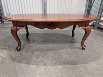 Classic Oval Hardwood Coffee Table with Carved Details
