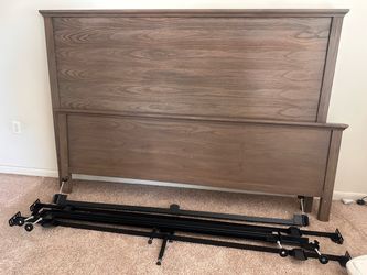 King size farm style bed. Headboard, footboard, and rails