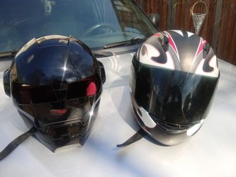 Two motorcycle helmets one large one xxl