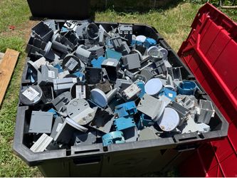 Big container full of electrical boxes