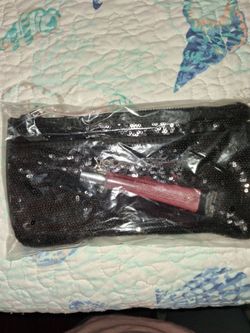 Brand new Victoria secret black sequence bag with lip gloss strawberry fizz