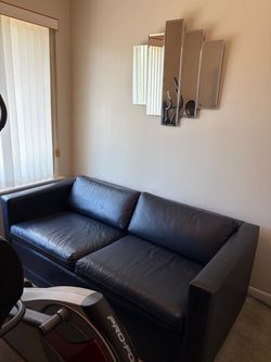 Blue leather pullout couch