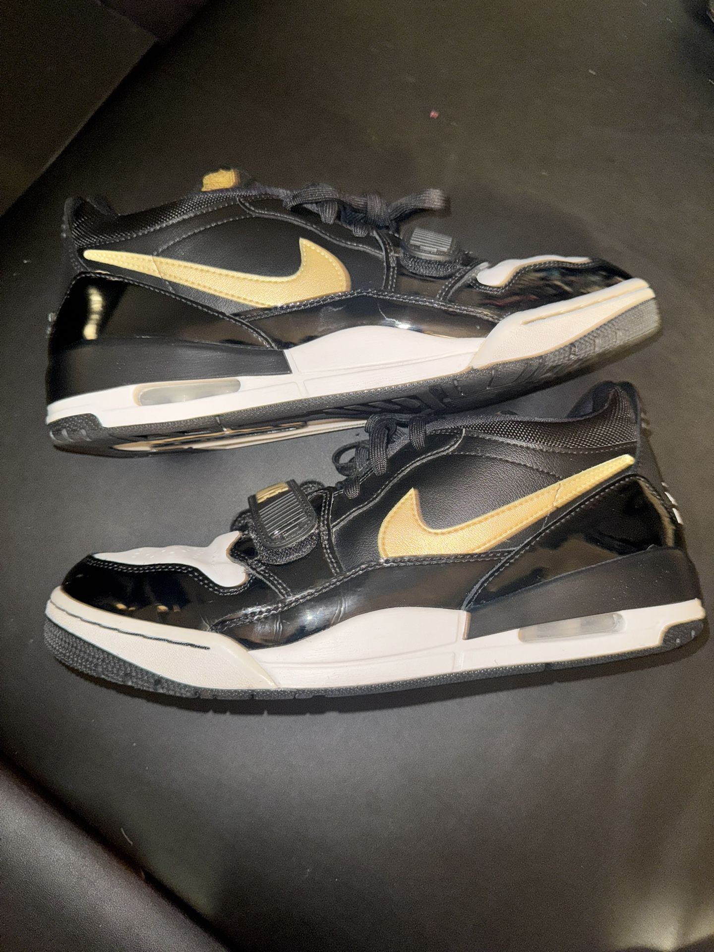 Size 10- Nike air Jordan legacy 312 low black metallic gold