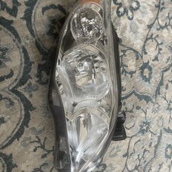 2013 Toyota Corolla LE headlight Passenger Side And Driver Side