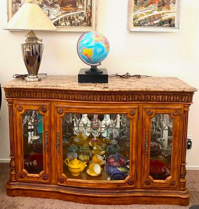*** FREE *** Lighted China Buffet With Marble top.  The lights And Mirrors Enhance your valuables Inside .