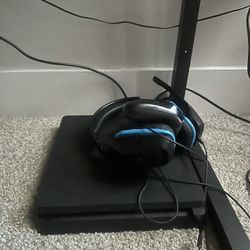 Ps4 with headphones and games