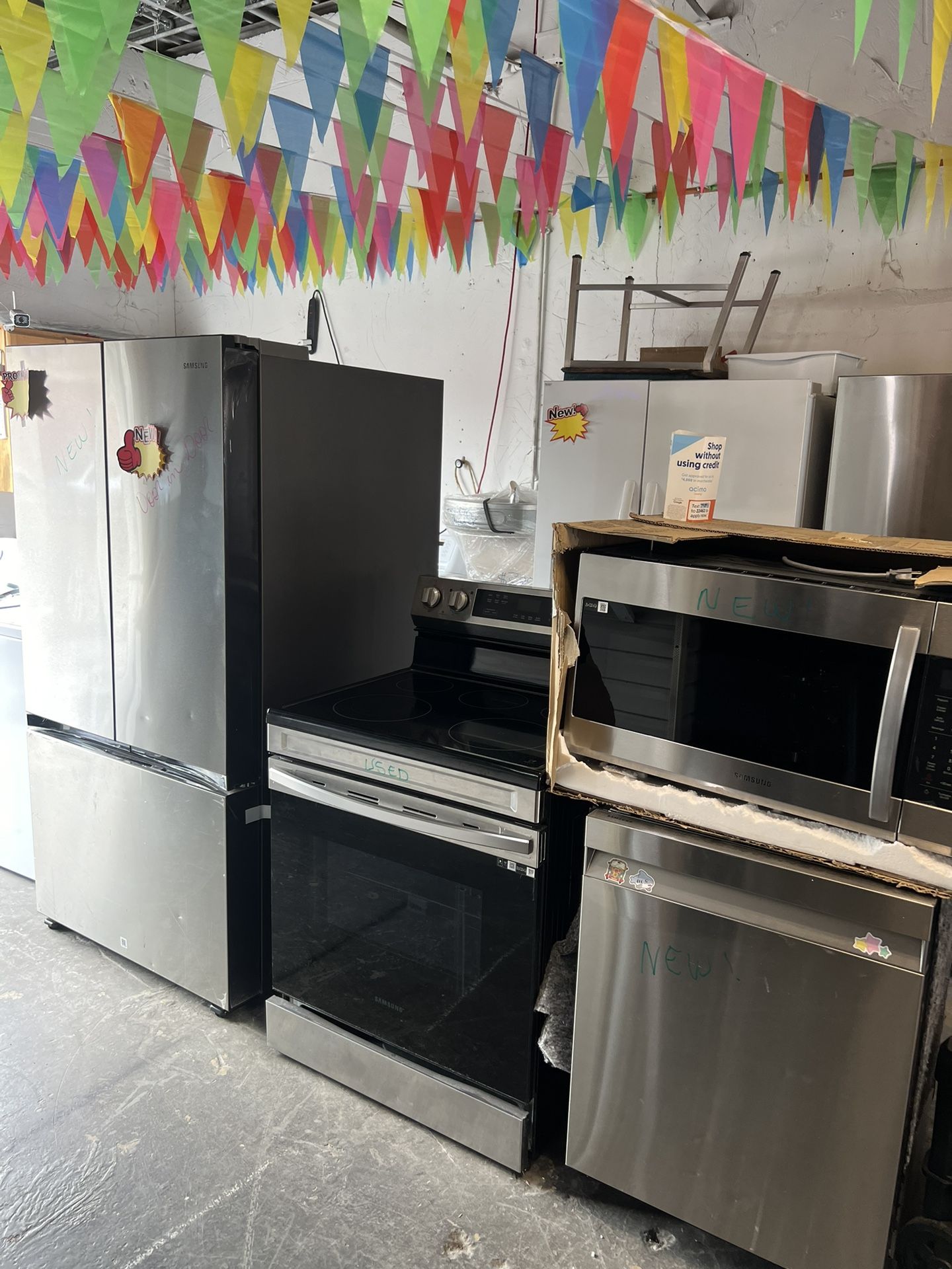 SAMSUNG NEW PACKEGE STAINLESS STEEL REFRIGERATOR USED STOVE MICROWAVE AND DISHWASHER ALL NEW EXCEPT STOVE