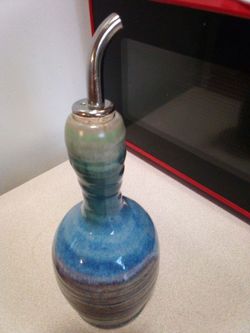Ceramic oil dispenser