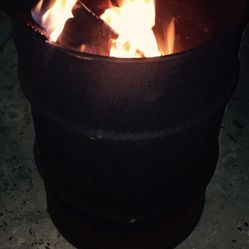 Fire pit 15 gallon drum heavy duty paint was burned off so the barrel won’t smoke