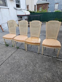 4 vintage caneback chairs