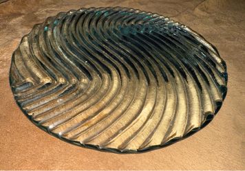 Heavy glass serving platter with cut in wave designs