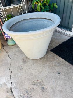 Pots planter plastic  18 inches tall  22 inches long