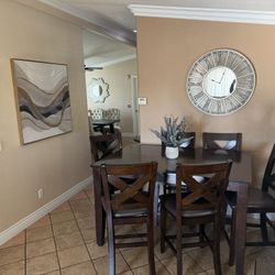 Dinning table with 6 high chairs 