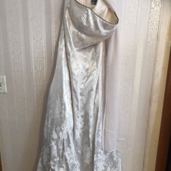  Wedding dress from 2003 size 5/6 used once preserved in plastic hundred dollars or best offer