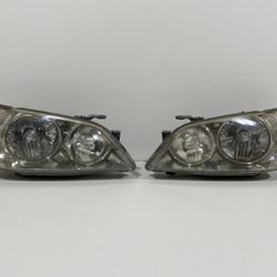 2001-2005 Lexus IS300 OEM Headlight Housings Chrome