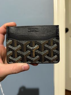 Black and brown designer cardholder.