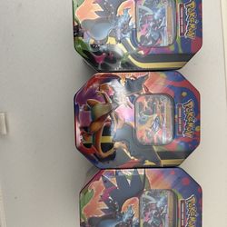 Mega Charizard Tins 3 Available