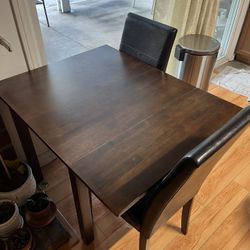 Table And Two Chairs 