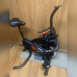 Spin Bike, Black Frame with Orange Accents, Resistance Knob and Console - New – Opelousas, LA