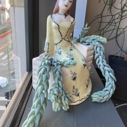 Vintage Lady Planter With Succulent Burrows Tail