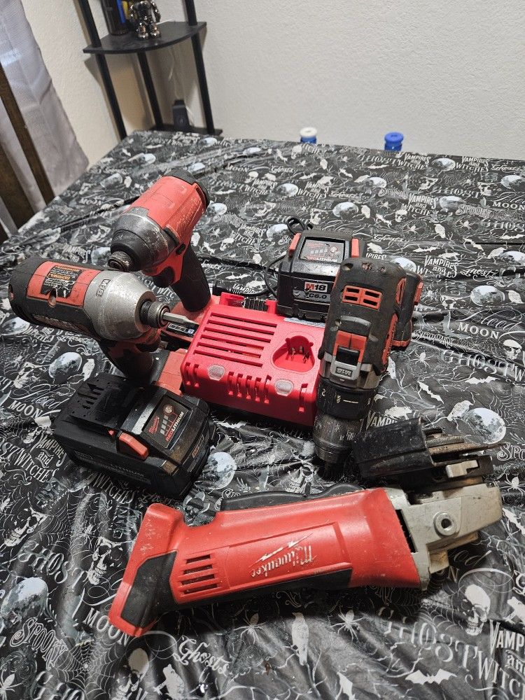 Milwaukee M18 Drill Grinder Batteries And Charger Combo