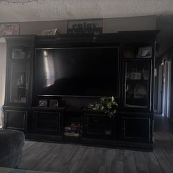 Black entertainment center with lights