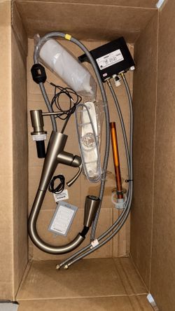 Moen MotionSense Wave kitchen faucet with soap dispenser