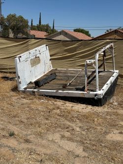 8 feet long flatbed and  10 feet long Utility bed