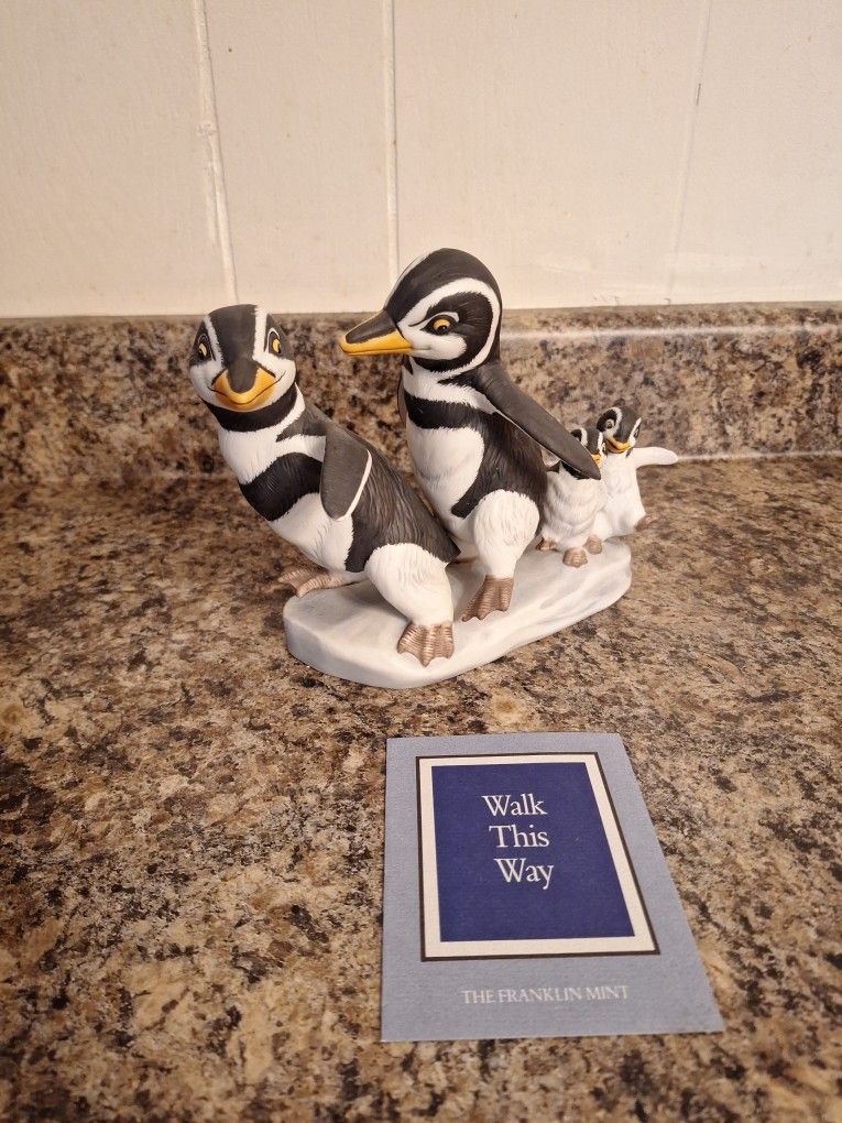 "Walk This Way" penguin family porcelain figurine by The Franklin Mint