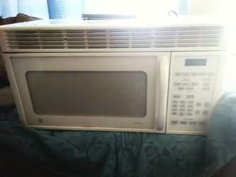 General Electric white over the stove microwave