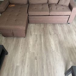Pull out Sofa bed (brown) with storage  space.