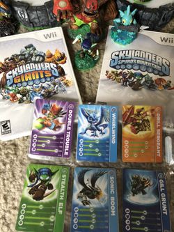 Skylander Wii games and 16 characters with carrying case