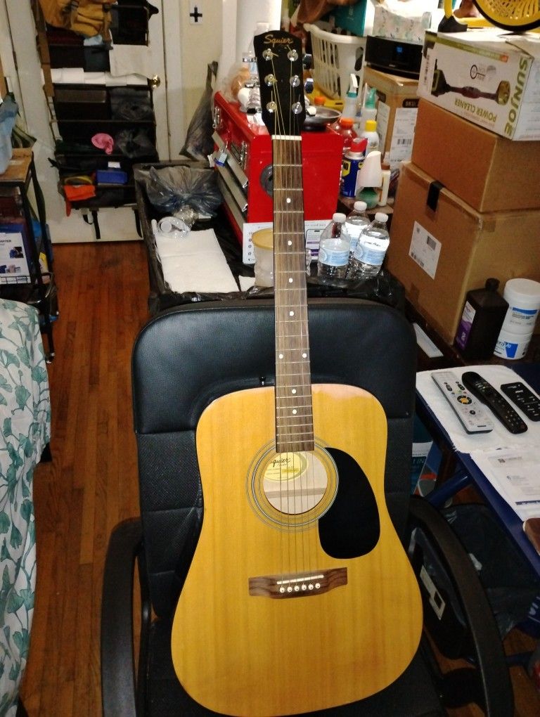 SQUIRE BY FENDER ACOUSTIC GUITAR MODEL: SA-50 VERY GOOD CONDITION ASKING $90 OBO.