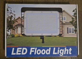 Brand new. DragonLight 240W LED Flood Light with Dusk to Dawn Photocell