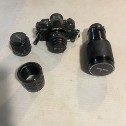 Minolta Model Number # X-700 35 mm Film Camera With Additional Lenses